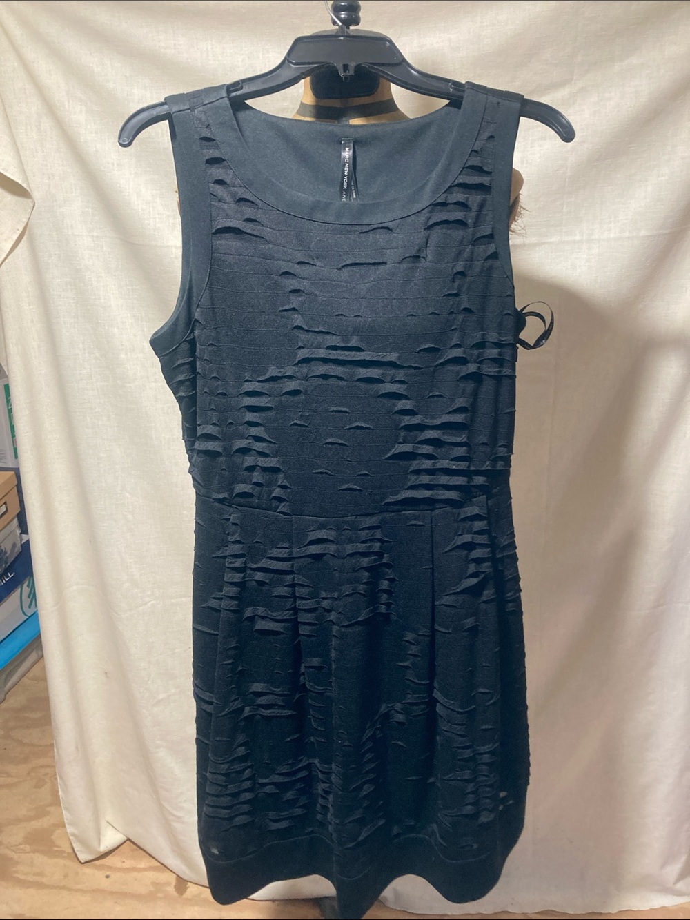 Black dress with material pattern through out.  See picture